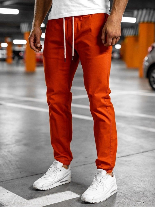 ciemnopomarańczowe spodnie dresowe